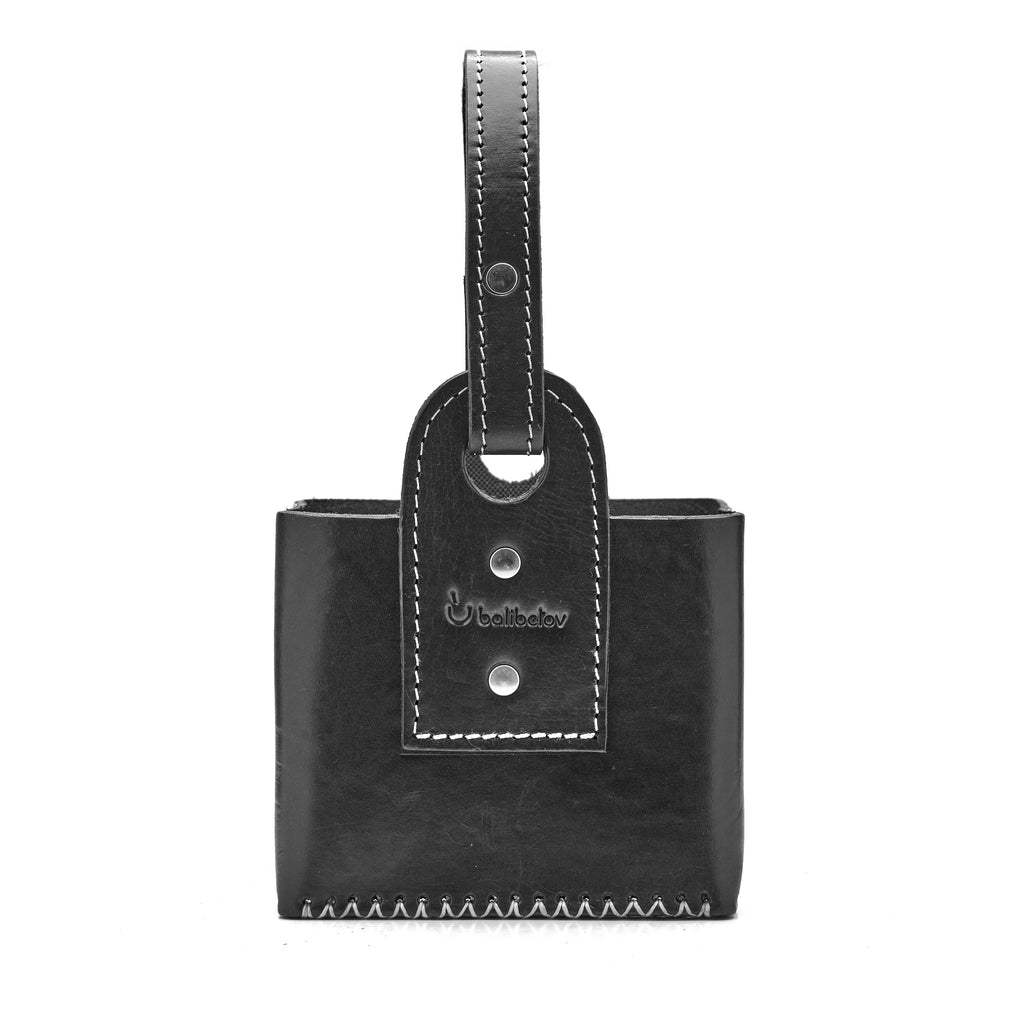 Le sac ouvert Matera - fait à la main avec du cuir véritable sculpté (noir)